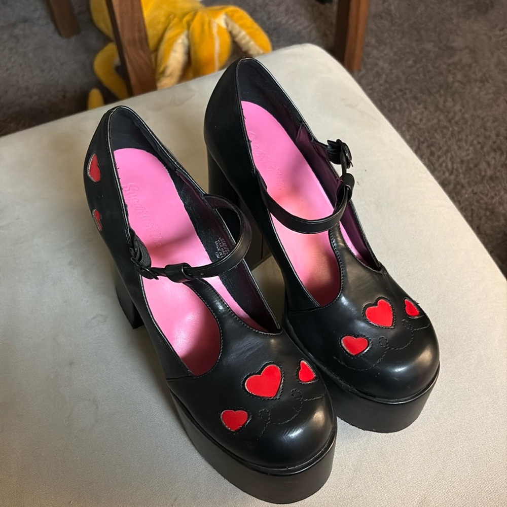 Black and pink hear platforms from dolls kill size 9. By Sugar Thrillz